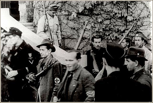 Militiamen on the day of the takeover at the Arrow Cross weapons depot at 10 Pasaréti Street, Budapest